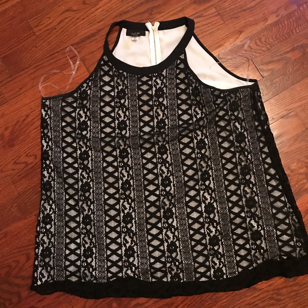 Lovely top  black lacy overlay fully lined. Zip closure at back.Really pretty on